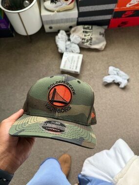 New Era Camo Snapback Hat with Orange Team Patch